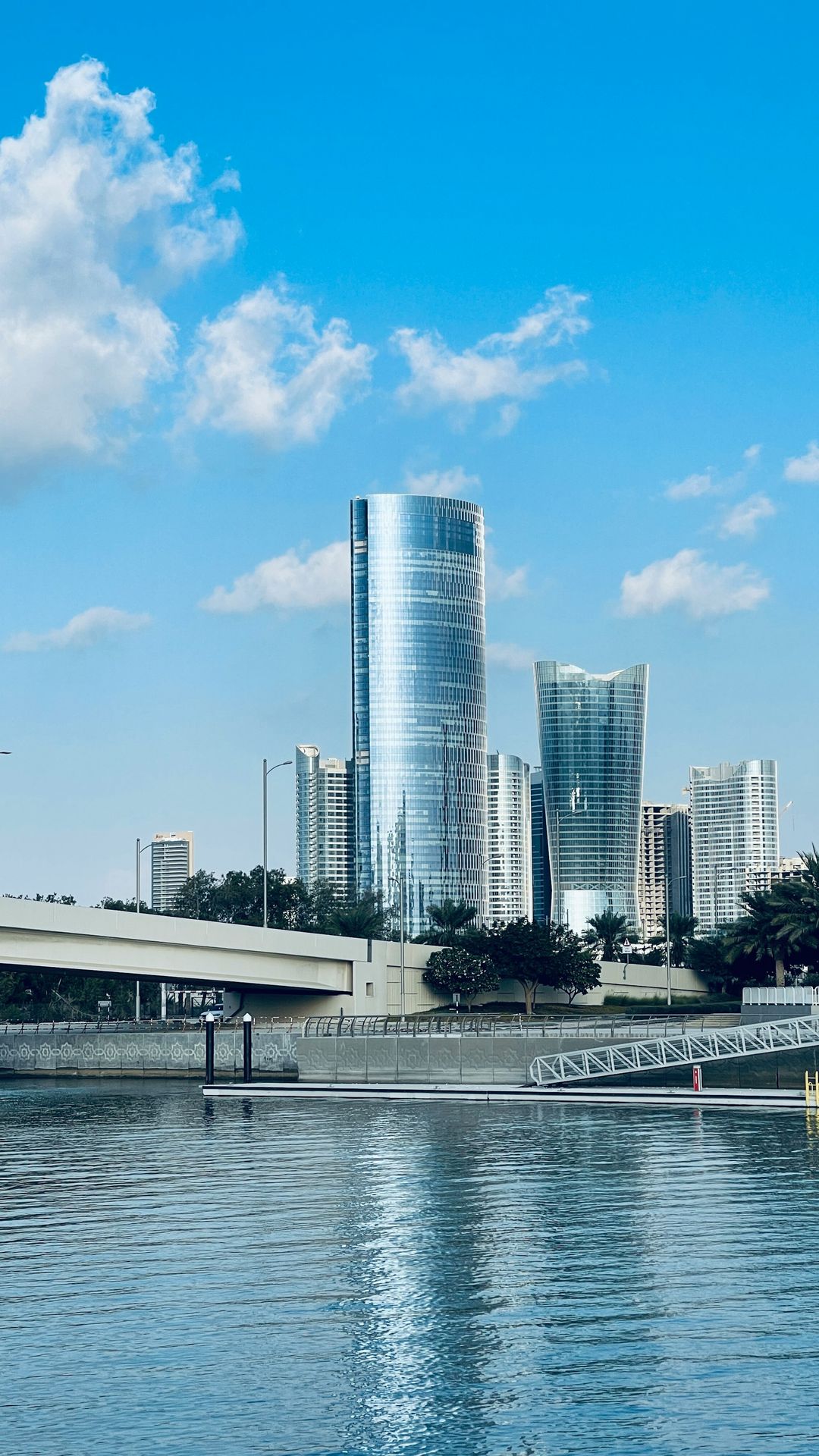 white concrete building near body of water during daytime